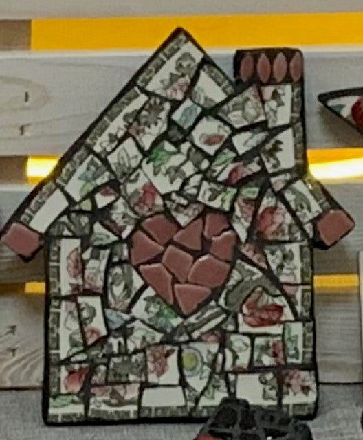 Mosaic house with heart