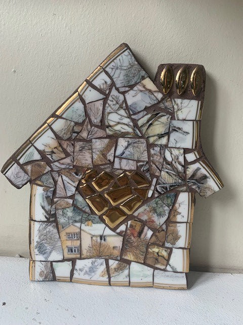 Mosaic house with heart